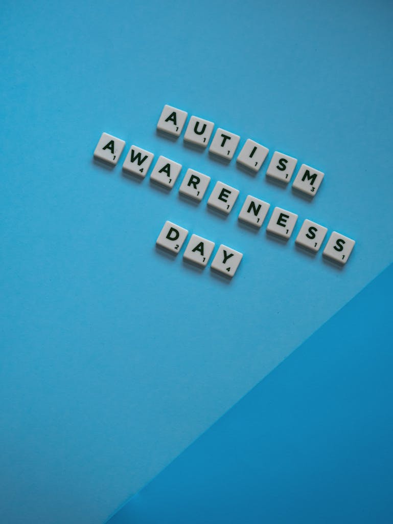 Overhead Shot of Autism Awareness Day in Scrabble Tiles